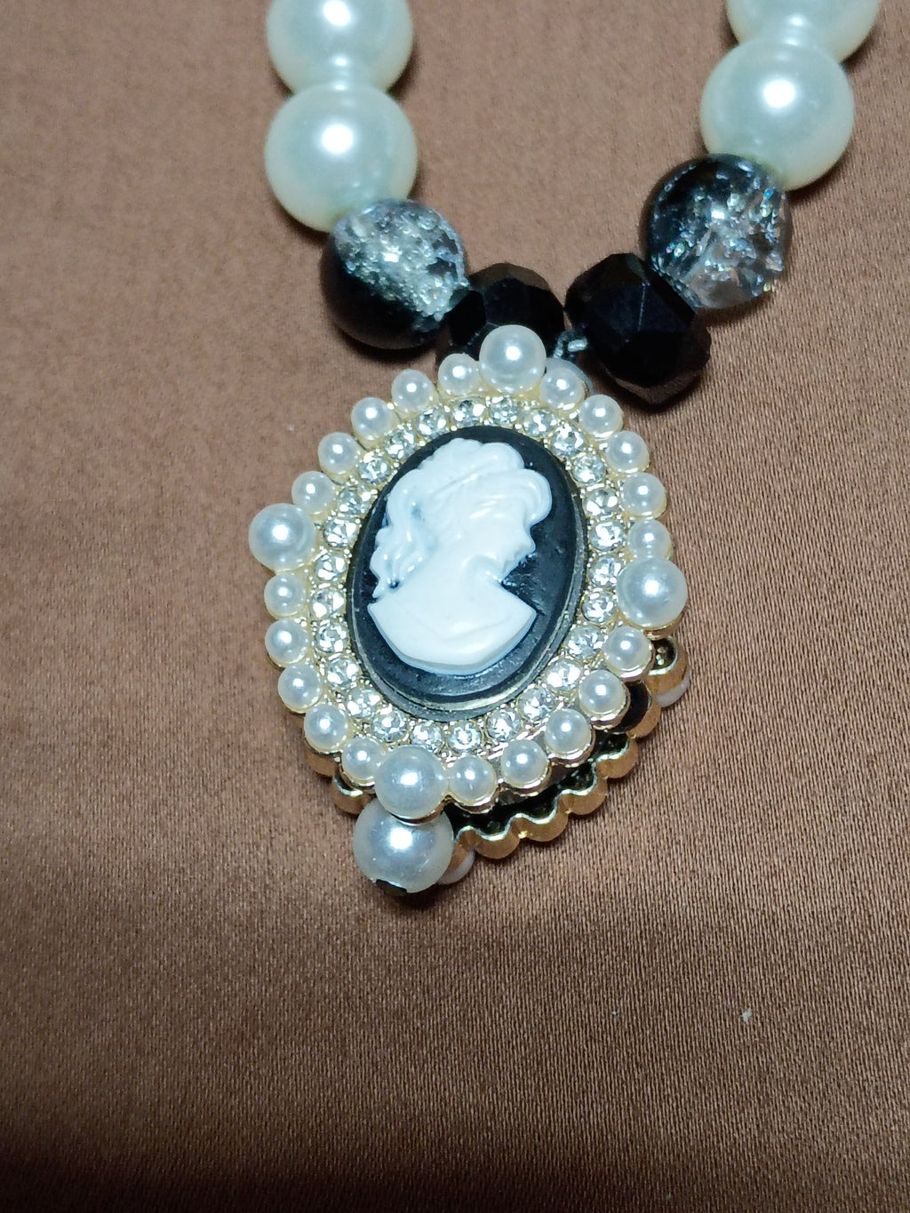 Debutante necklace cameo pendant close-up