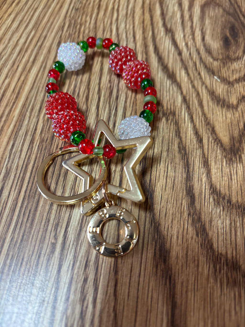 Gum Drops bracelet and keychain with festive acrylic beads, gold-tone star, and Believe charm
