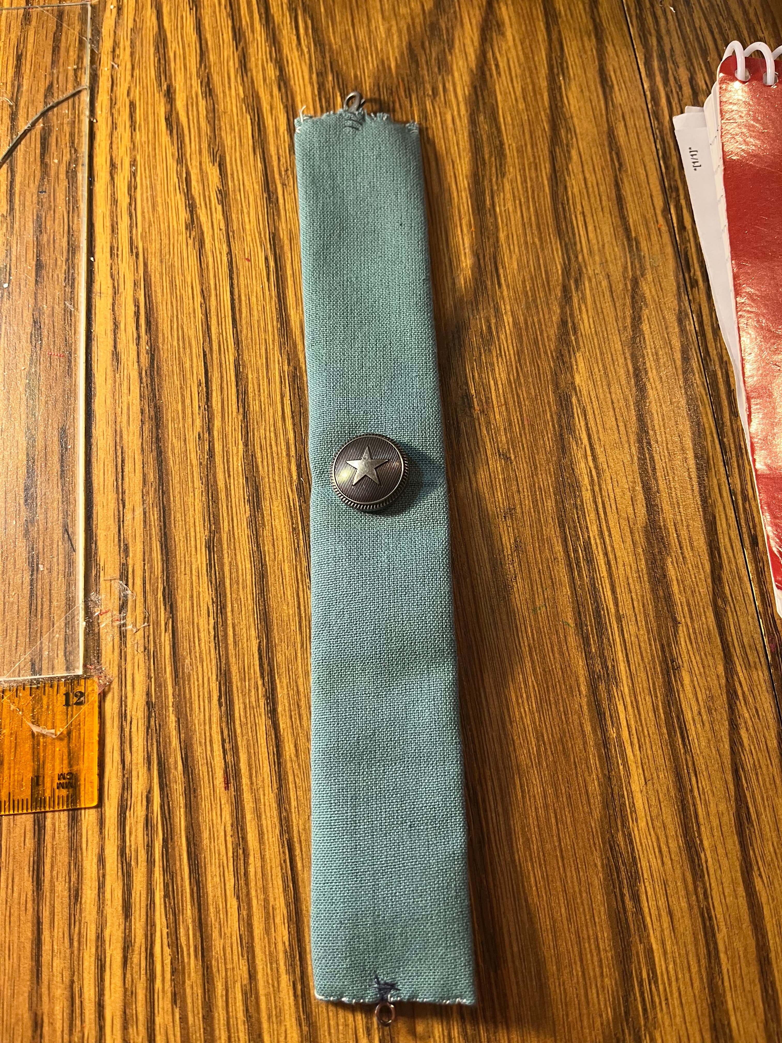 Nautical teal wrist wrap full length showing silver lobster clasp