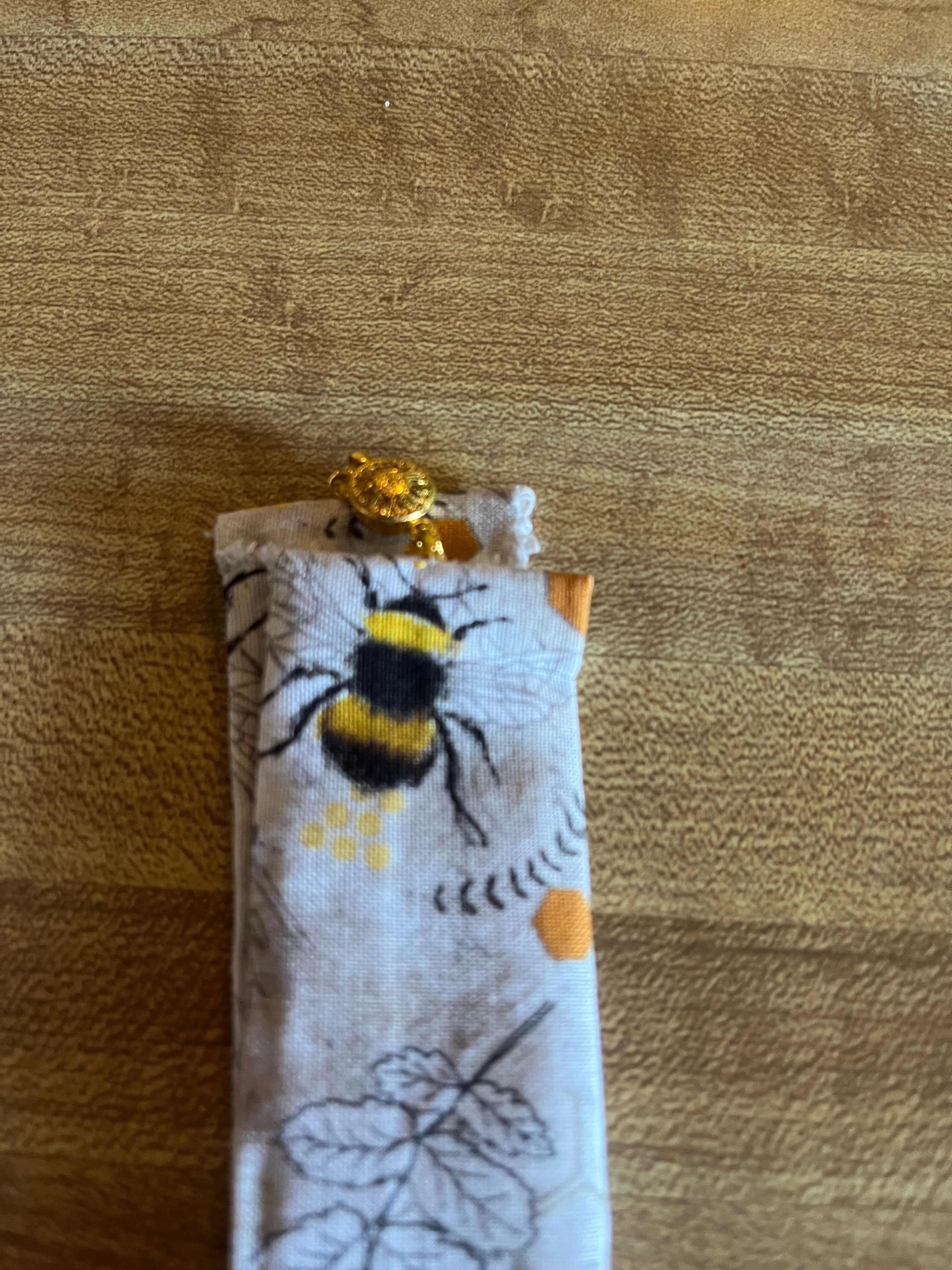 Bee Still fabric wrist cuff top view