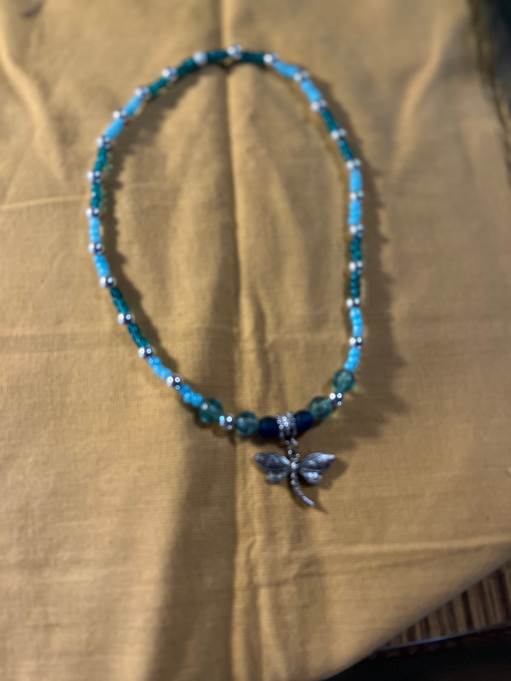 Gentle Flight dragonfly necklace lifestyle photo
