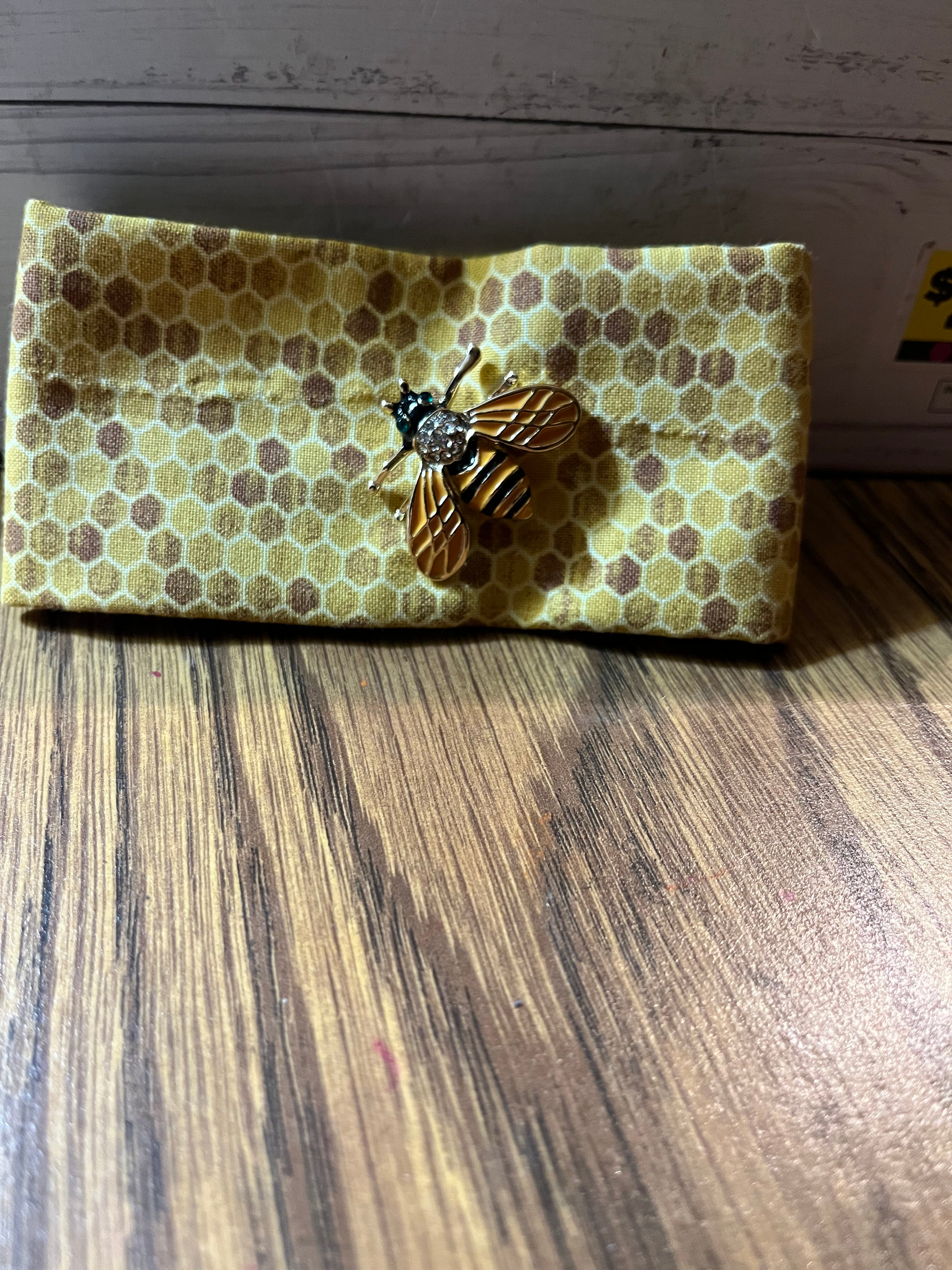 Queen Bee fabric wrist cuff front view