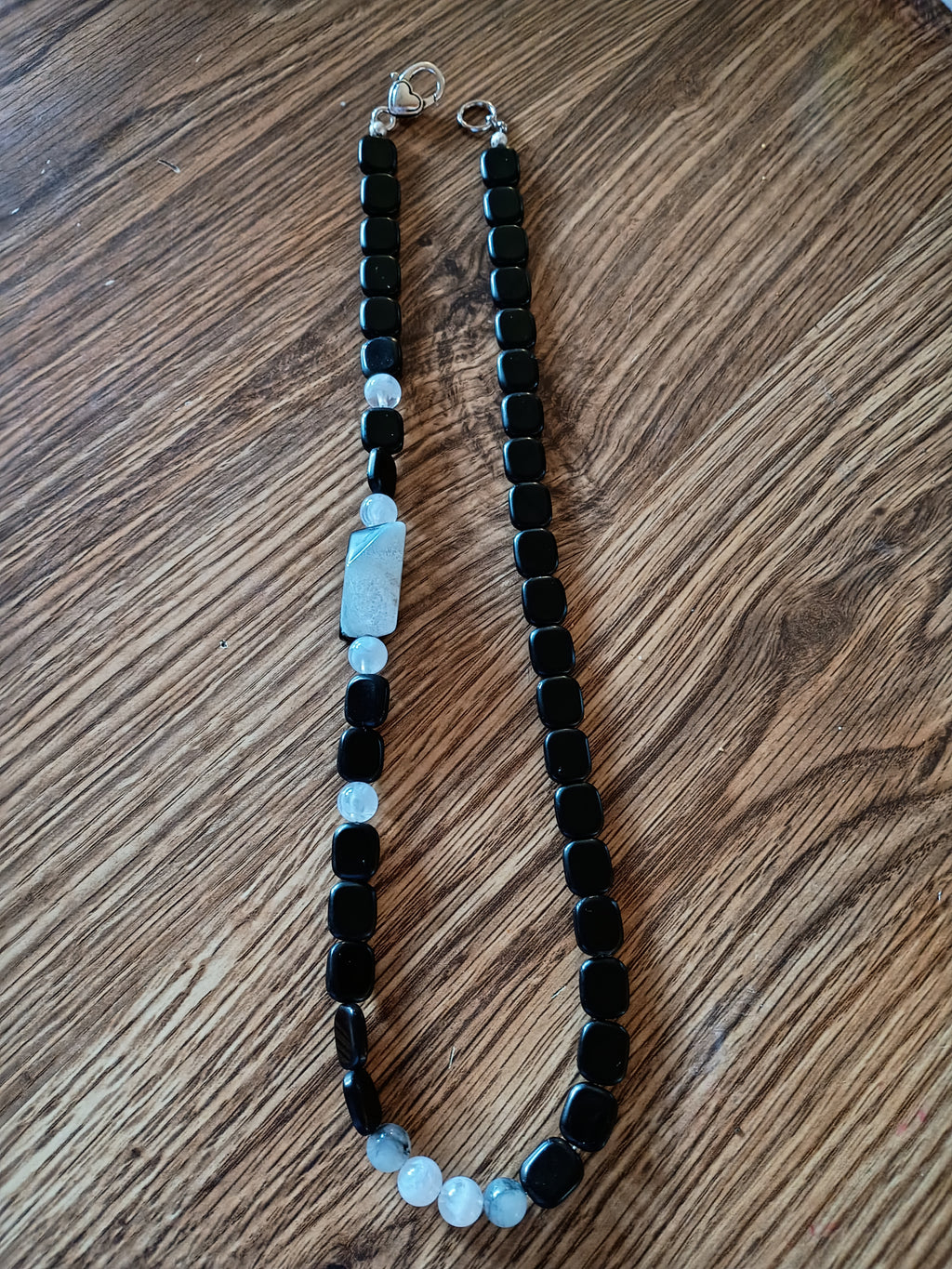 Strength necklace raw photo