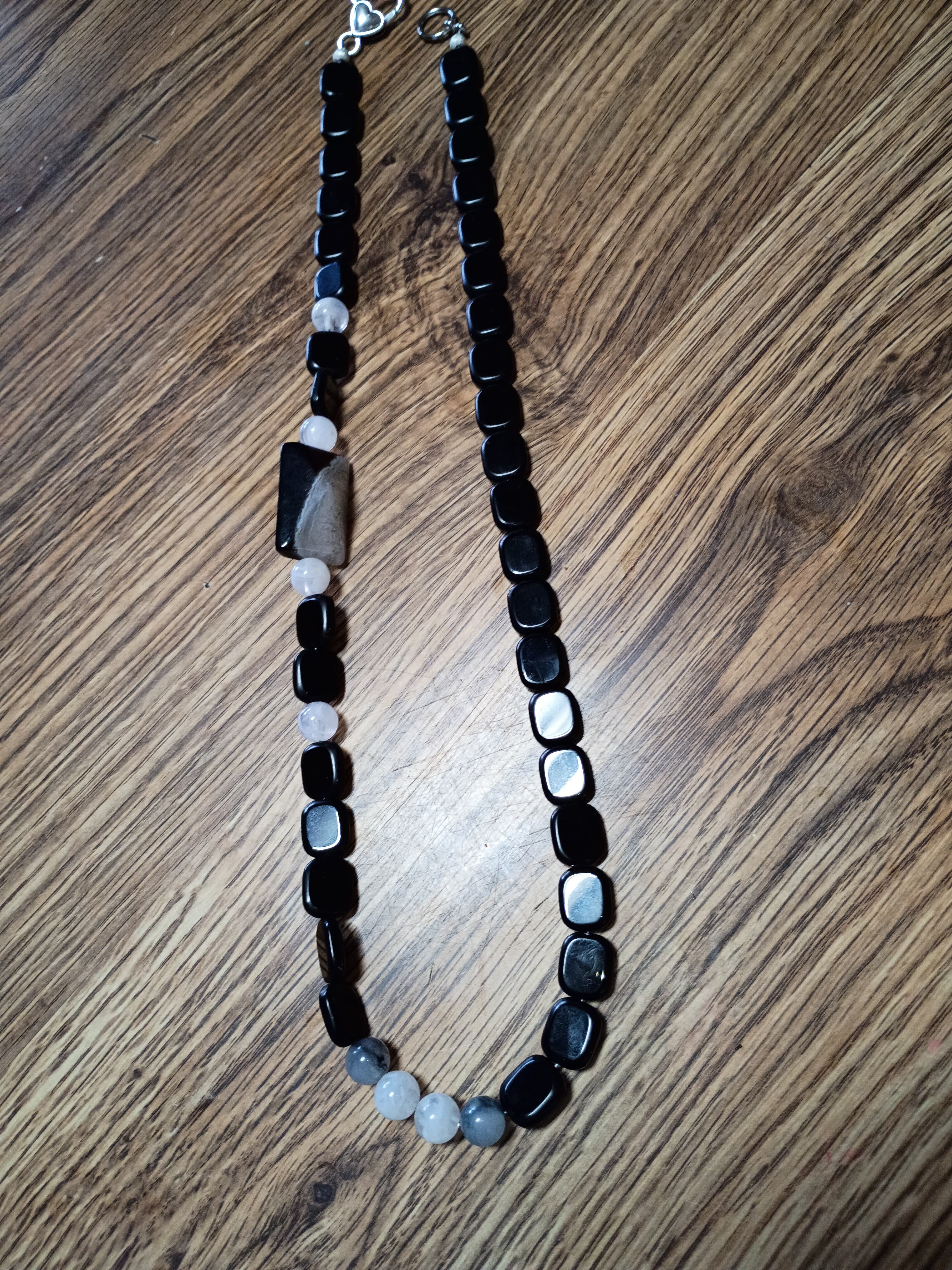 Strength necklace detail photo